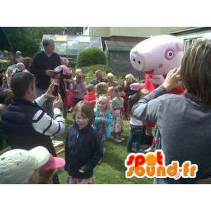 Rosa Schwein-Maskottchen in rot gekleidet - MASFR005736 - Maskottchen Schwein