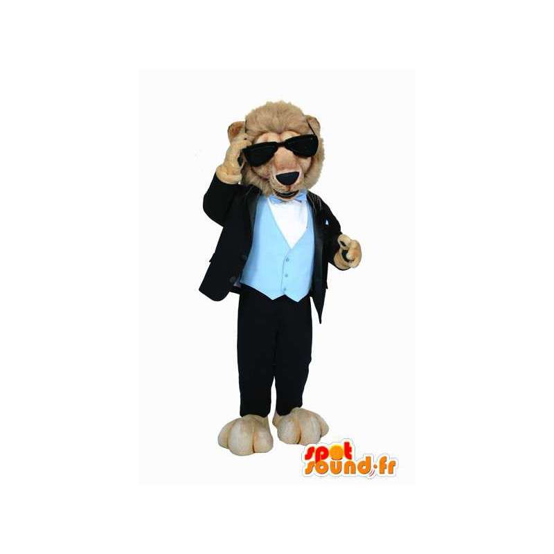 Lejonmaskot i kostym, med mörka glasögon - Spotsound maskot