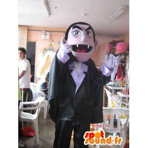 Mascot vampiro vestido con un traje y una capa de color negro - MASFR006047 - Mascotas de los monstruos