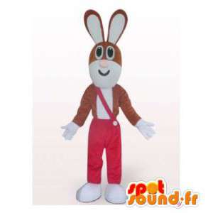 Brun och vit kaninmaskot i röd overall - Spotsound maskot