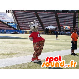 Vlk Mascot s květinovými kalhotami a červené tričko - MASFR20411 - vlk Maskoti