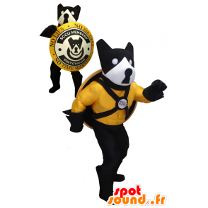 Black dog mascot, yellow and white with a shield - MASFR20454 - Dog mascots
