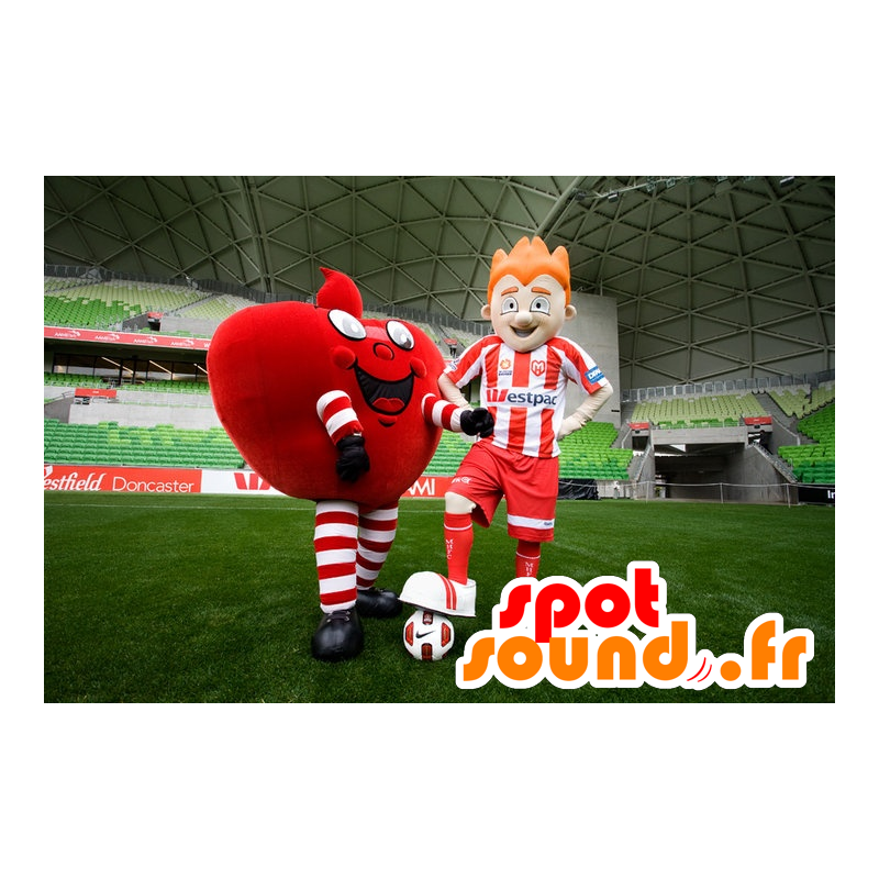 2 mascots, a giant red heart, and a footballer - MASFR20463 - Valentine mascot