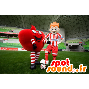 2 mascots, a giant red heart, and a footballer - MASFR20463 - Valentine mascot