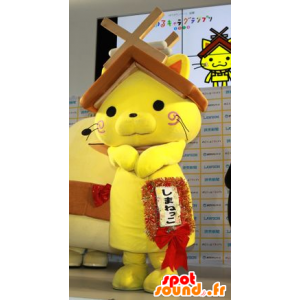 Gelbe Katze Maskottchen mit einem Haus Dach über dem Kopf - MASFR20595 - Maskottchen nach Hause