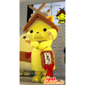 Mascote gato amarelo com um telhado da casa sobre sua cabeça - MASFR20595 - mascotes Casa