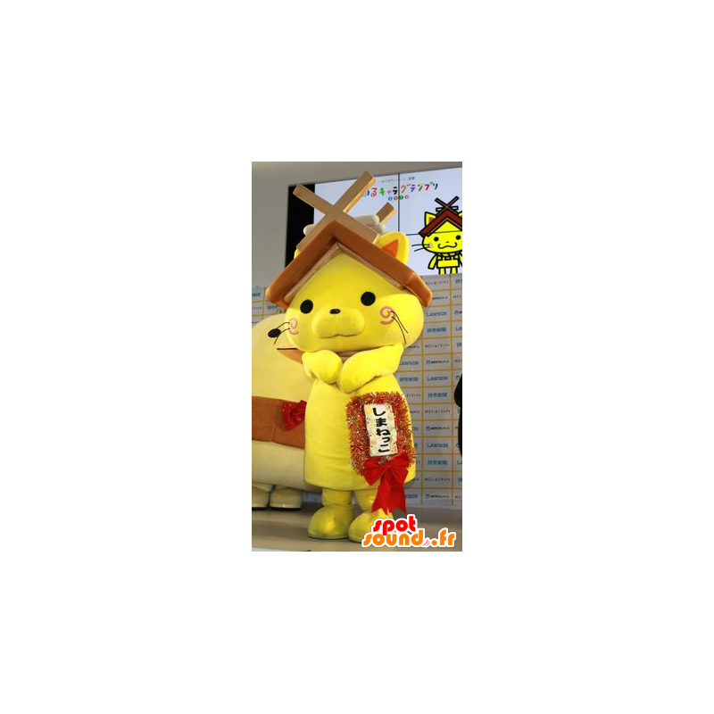 Gelbe Katze Maskottchen mit einem Haus Dach über dem Kopf - MASFR20595 - Maskottchen nach Hause