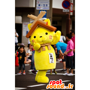 Yellow cat mascot with a house roof over your head - MASFR20595 - Mascots home