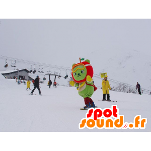 Grøn bjørnemaskot med et æbleformet hoved - Spotsound maskot