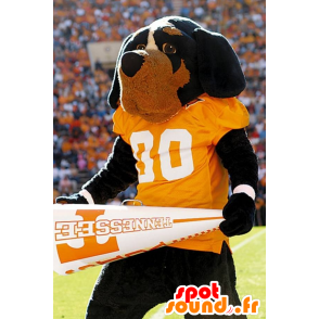 Black and brown dog mascot with a yellow t-shirt - MASFR20882 - Dog mascots