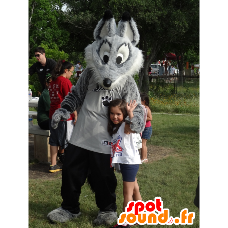 Maskottchen-grau und weiß Wolf in der Sportkleidung - MASFR20986 - Maskottchen-Wolf Maskottchen-grau und weiß Wolf in der Sportkleidung - MASFR20986 - Maskottchen-Wolf