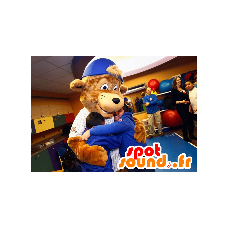 Brun bjørnemaskot med hue - Spotsound maskot kostume Brun bjørnemaskot med hue - Spotsound maskot kostume