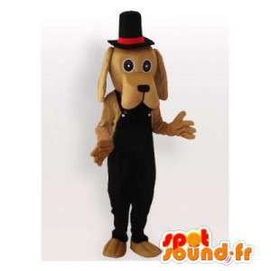 Beige hundemaskot med sort overall og hat - Spotsound maskot