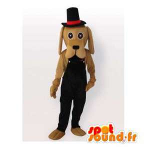 Beige hundemaskot med sort overall og hat - Spotsound maskot