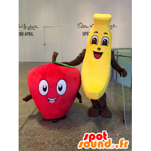 2 maskotar: en gul banan och en röd jordgubbe - Spotsound maskot