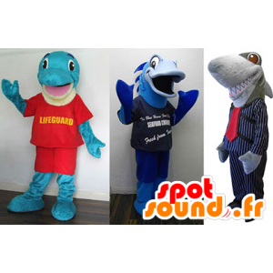 3 maskotar: en blå delfin, en blå fisk och en grå haj -