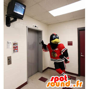 Mascot av svart og hvit fugl med en rød idrett uniform - MASFR21450 - Mascot fugler