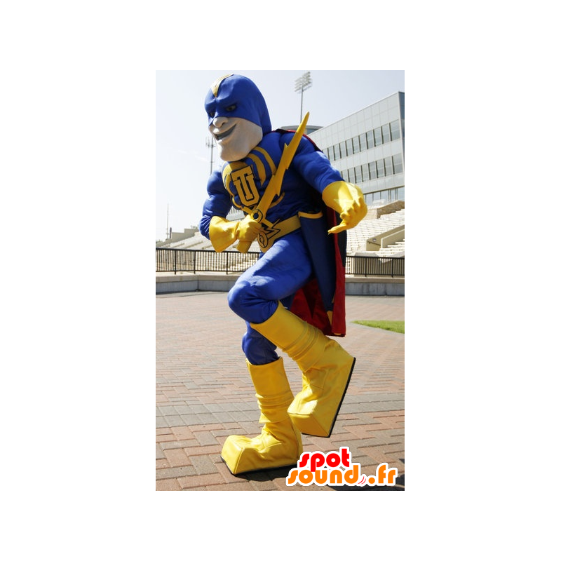 Superheld mascotte houdt geel en blauw, met een cape - MASFR21508 - superheld mascotte