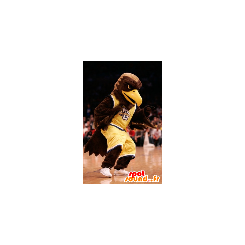 Brown eagle mascot dressed in yellow sportswear - MASFR21523 - Mascot of birds
