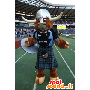 Brun ko maskot, tyr, med en kilt og en hjelm - Spotsound maskot