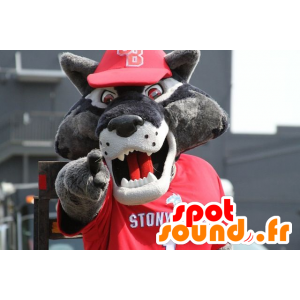 Grå ulvemaskot, i rødt sportstøj - Spotsound maskot kostume