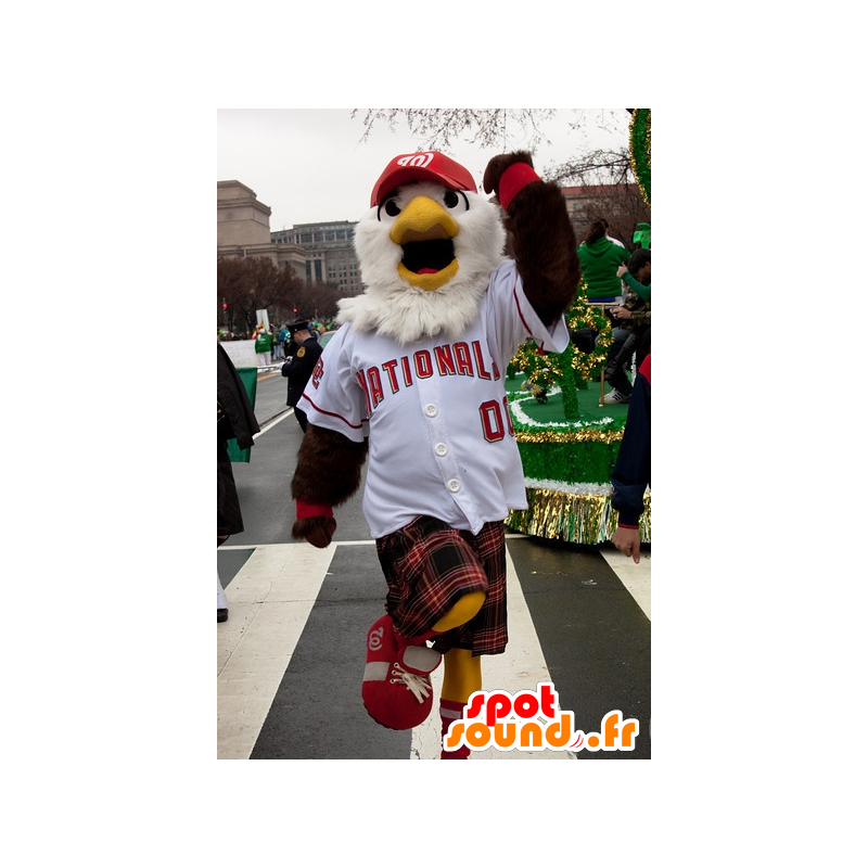 Mascot marrón y águila blanca en ropa deportiva con una falda escocesa - MASFR21668 - Mascota de aves