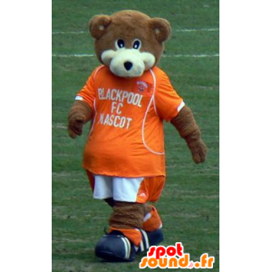 Mascot bruine en witte teddybeer met een oranje outfit - MASFR21720 - Bear Mascot