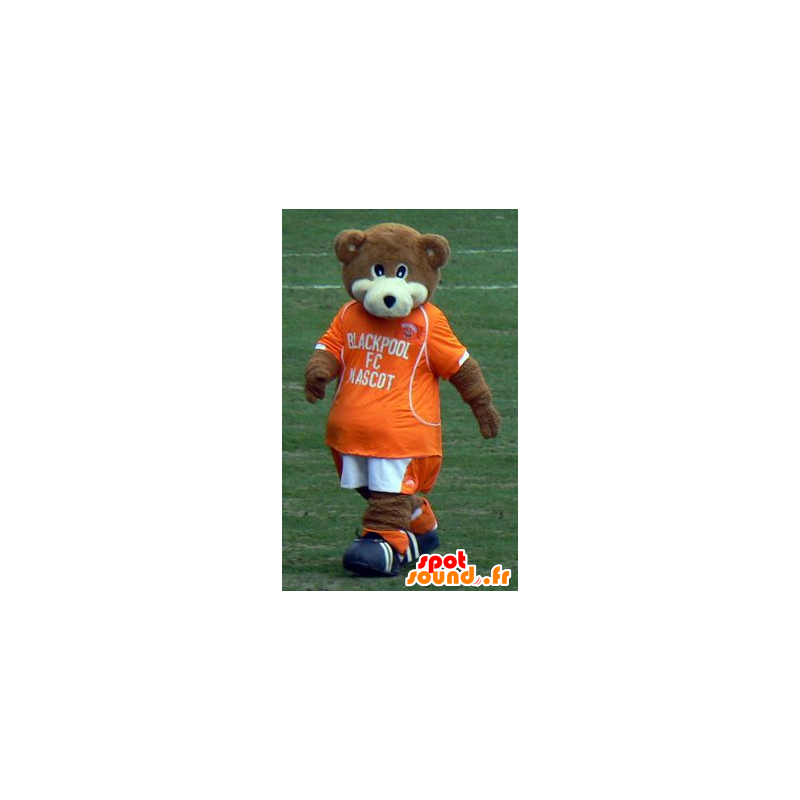 Mascot bruine en witte teddybeer met een oranje outfit - MASFR21720 - Bear Mascot
