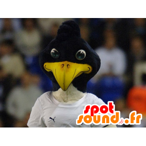 Mascotte d'oiseau noir et blanc, en tenue de sport - MASFR21734 - Mascotte d'oiseaux