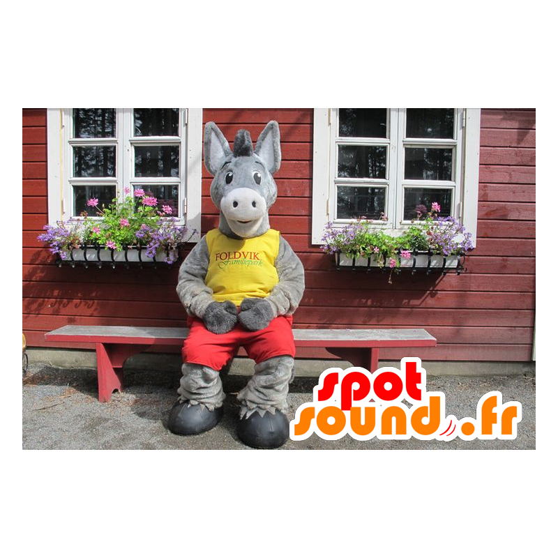 Gray donkey mascot holding yellow and red - MASFR21789 - Farm animals