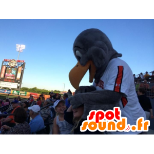 Gray eagle mascot in white sportswear and orange - MASFR21791 - Mascot of birds