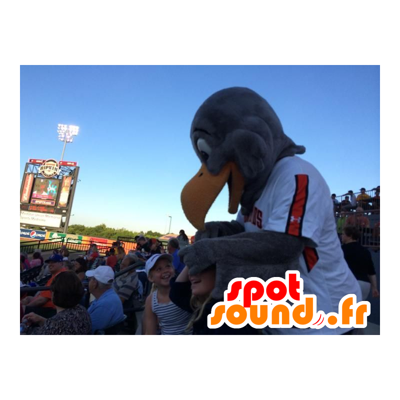 Gray eagle mascot in white sportswear and orange - MASFR21791 - Mascot of birds Gray eagle mascot in white sportswear and orange - MASFR21791 - Mascot of birds