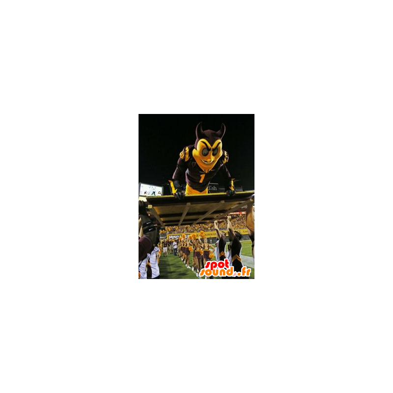 Mascotte de diable noir et jaune, en tenue de sport - MASFR21843 - Mascotte sportives Mascotte de diable noir et jaune, en tenue de sport - MASFR21843 - Mascotte sportives