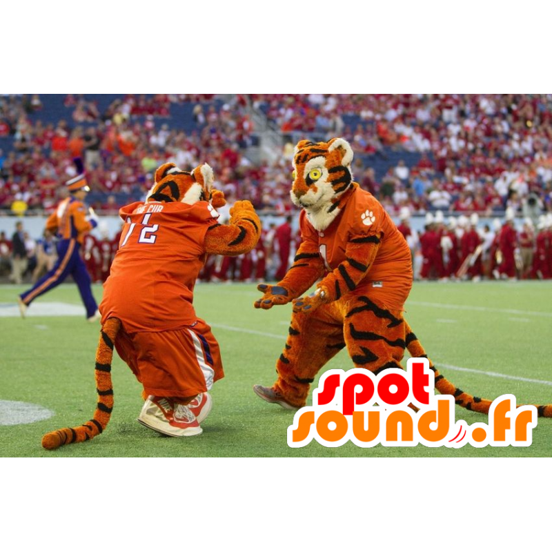 2 maskotter af tigre, appelsiner, sort og hvid - Spotsound 2 maskotter af tigre, appelsiner, sort og hvid - Spotsound