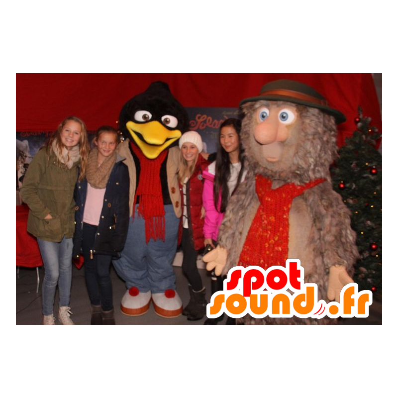 2 maskotar, en pingvin och en furry brun yeti - Spotsound maskot