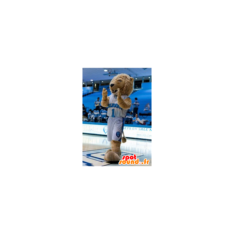 Beige-Löwe-Maskottchen, in blau und weiß gekleidet Sport - MASFR21956 - Löwen-Maskottchen