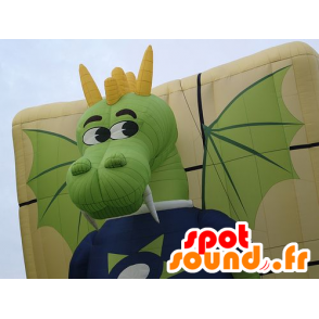 Mascotte de dragon vert et jaune, rigolo et coloré - MASFR22036 - Mascotte de dragon