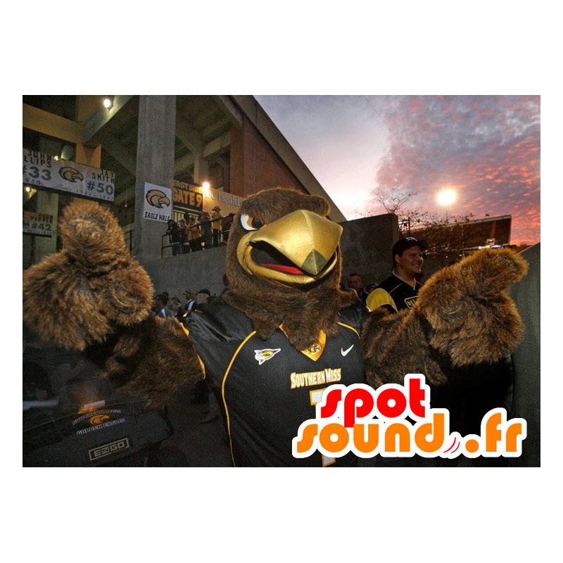 Of brown eagle mascot in black sportswear - MASFR22062 - Mascot of birds Of brown eagle mascot in black sportswear - MASFR22062 - Mascot of birds