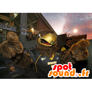 Of brown eagle mascot in black sportswear - MASFR22062 - Mascot of birds