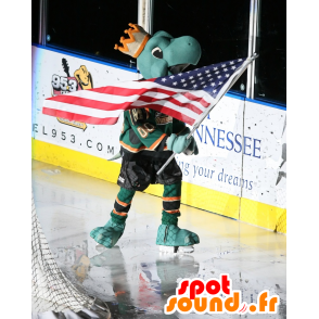 Tartaruga verde mascotte con una corona e in possesso di un hockey - MASFR22067 - Tartaruga mascotte