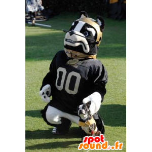Hund Maskottchen Schwarz und Weiß, mit einem Helm und einem Trikot - MASFR22076 - Hund-Maskottchen