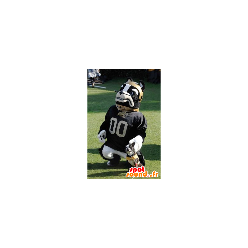 Dog mascot black and white, with a helmet and a jersey - MASFR22076 - Dog mascots Dog mascot black and white, with a helmet and a jersey - MASFR22076 - Dog mascots