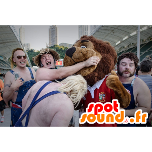 Mascota de Brown león, todo peludo, vestido deportivo rojo - MASFR22086 - Mascotas de León
