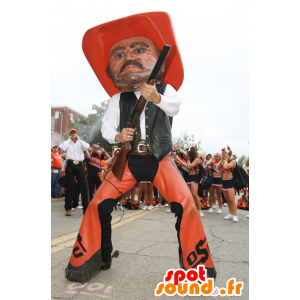 Cowboy mascotte oranje en zwarte traditionele kleding - MASFR22102 - Human Mascottes