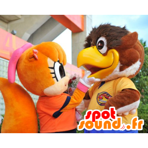 2 maskotteja, iso ruskea lintu ja orava oranssi - MASFR22111 - maskotti lintuja