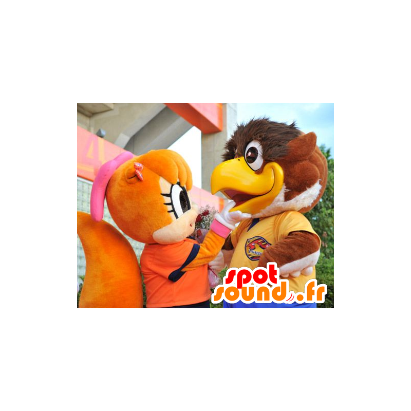 2 mascots, a big brown bird and a squirrel orange - MASFR22111 - Mascot of birds