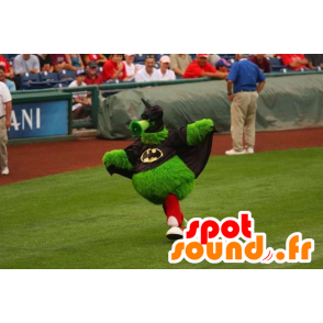 Green monster mascot, all hairy, dressed as Batman - MASFR22129 - Monsters mascots