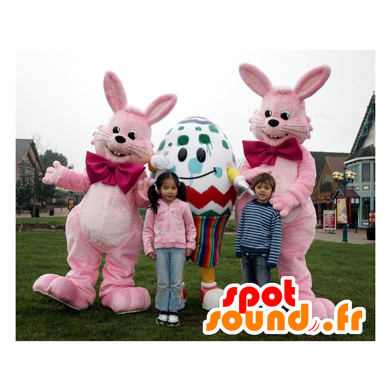 3 maskotar påsk, 2 rosa kaniner och ett jätteägg - Spotsound 3 maskotar påsk, 2 rosa kaniner och ett jätteägg - Spotsound