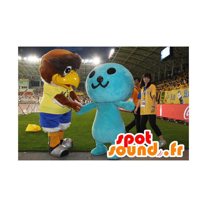 2 mascotte, un grande uccello marrone e un uomo blu - MASFR22194 - Mascotte degli uccelli 2 mascotte, un grande uccello marrone e un uomo blu - MASFR22194 - Mascotte degli uccelli