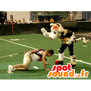 Beige och svart tigermaskot i sportkläder - Spotsound maskot